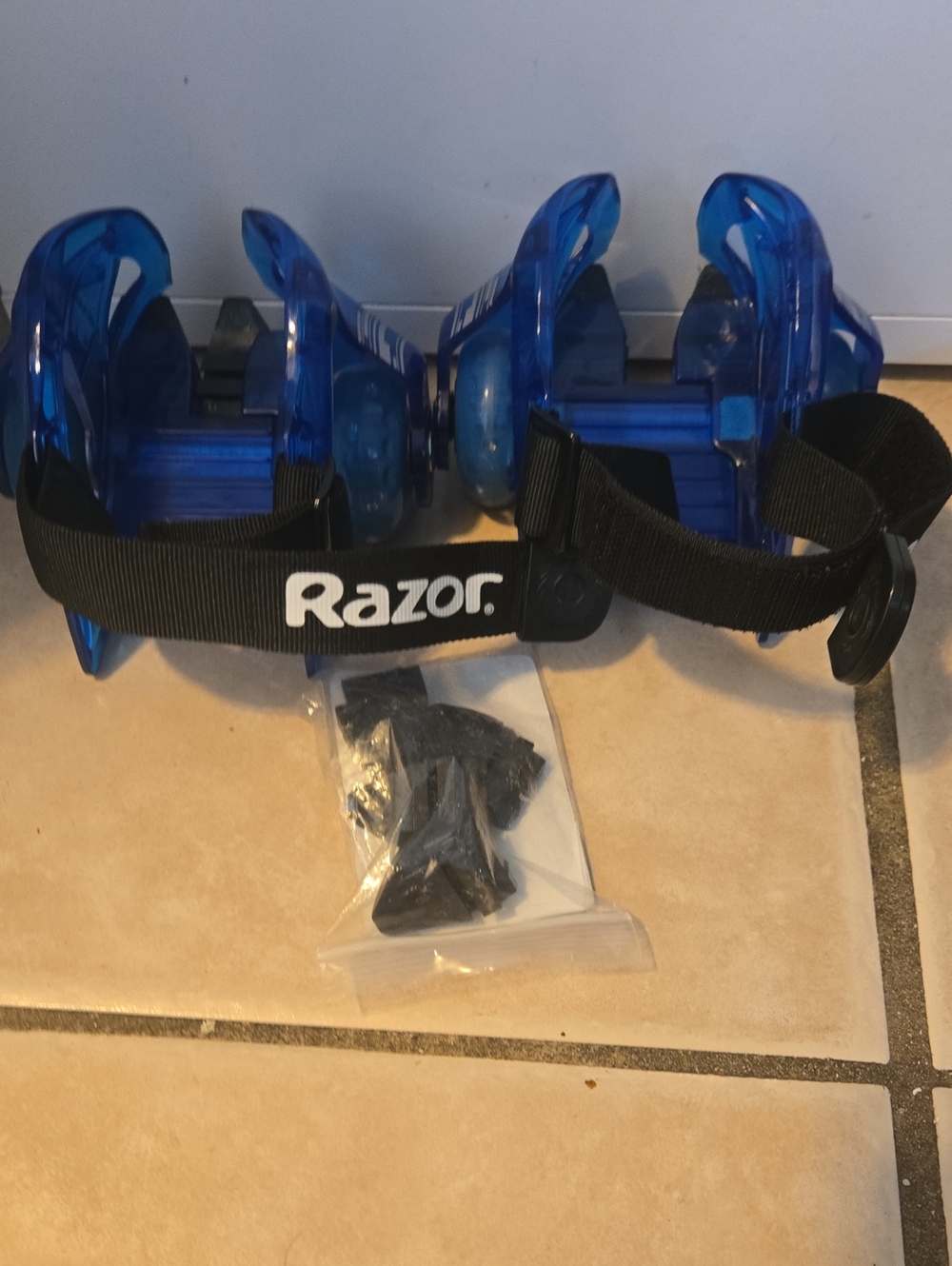 Razor Blue LED Heel Wheels with Black Straps